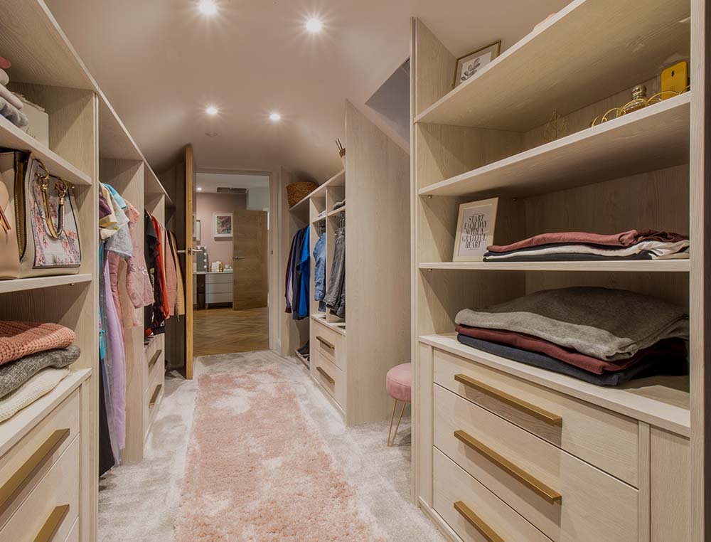 walk in wardrobe with clothing