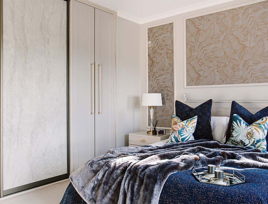 bed with hinge and sliding wardrobe unit