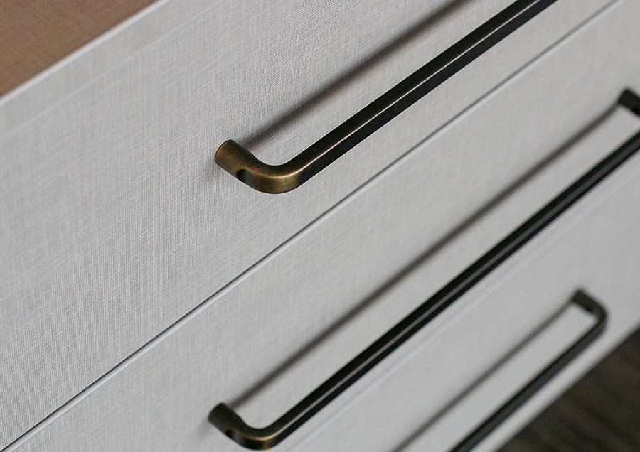 close up of handles on freestanding unit