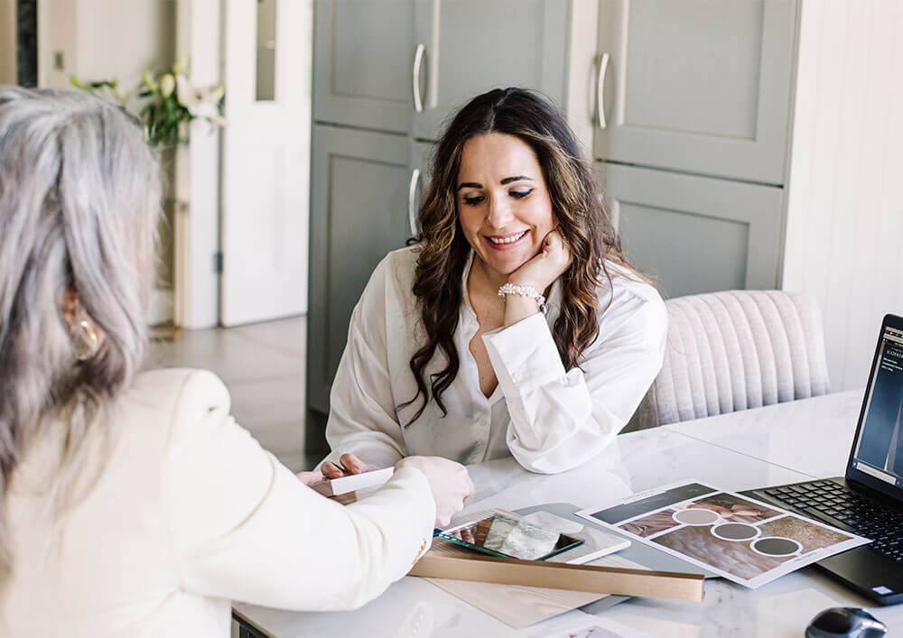 designer talking to customer about finishes