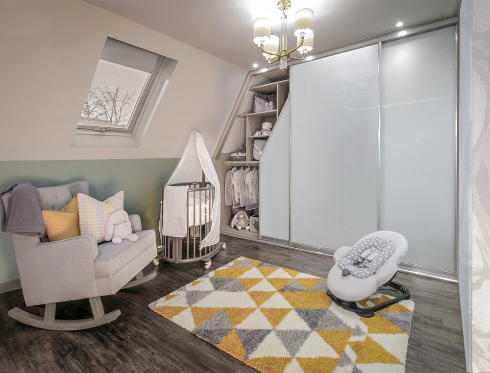 baby room with angled sliding wardrobe