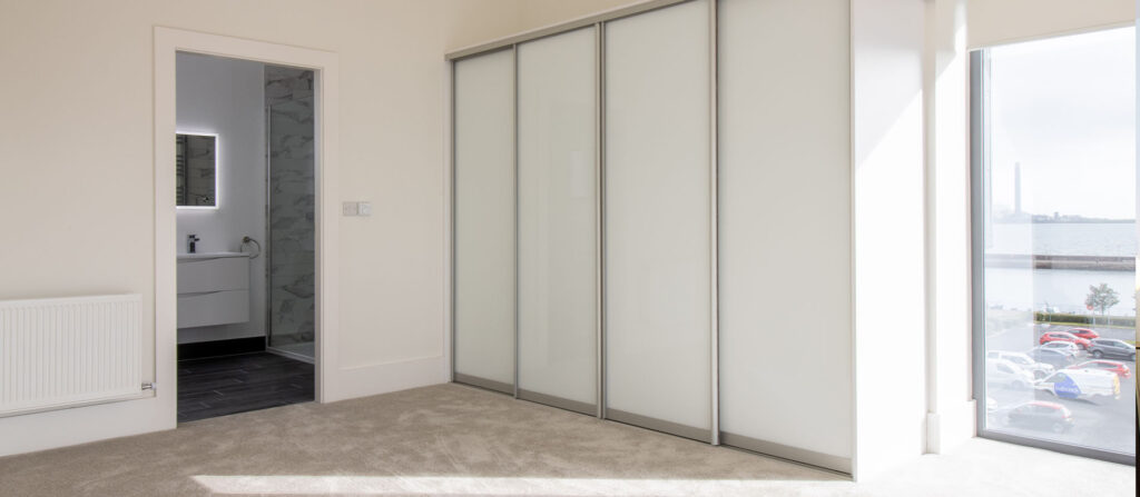 white glass sliding wardrobe